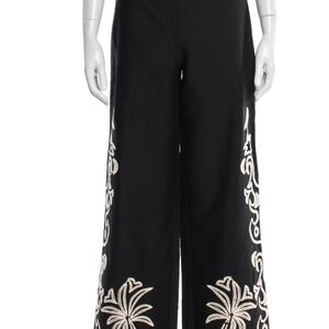 Maje Black Wide-Leg Pants with Cream Embroidered Floral Detail.
